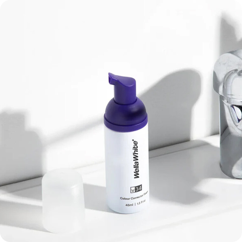 Brushing with the WellaWhite whitening foam